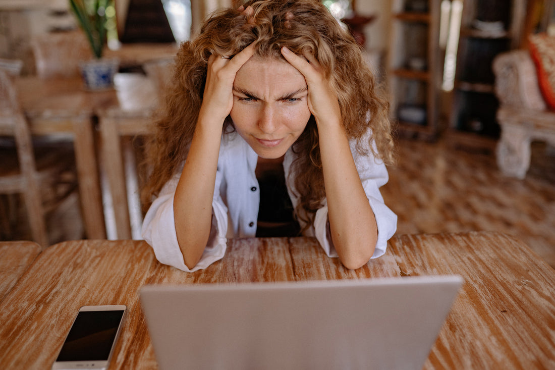 Woman concentrating in front of a computer