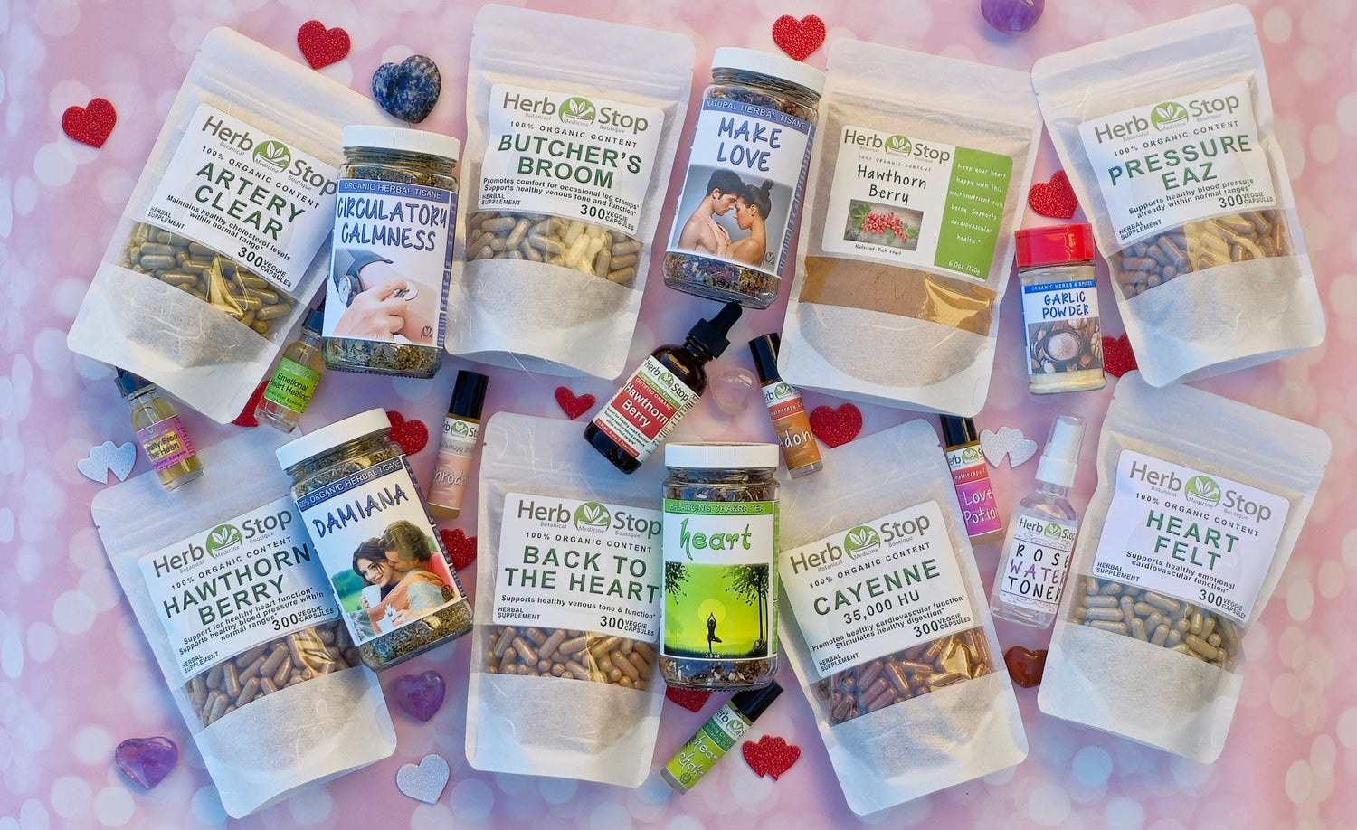 Collection of heart health herbs and products from Herb Stop, including capsules, teas, herbal extracts, and wellness blends, displayed on a pink Valentine’s Day-themed background with hearts.