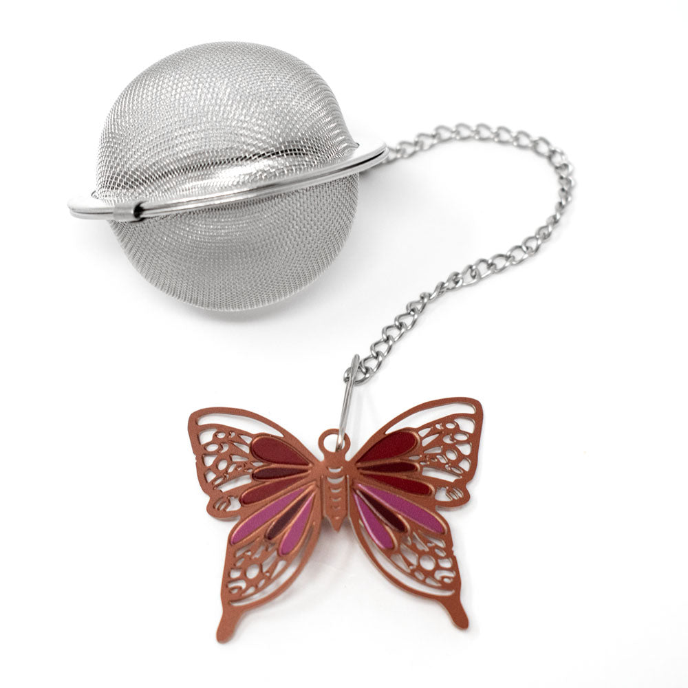 Tea ball with butterfly weight